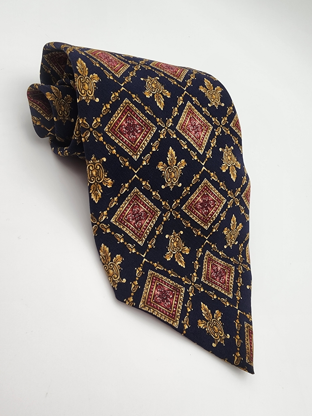 MMA Classic Navy Men's Tie with Gold and Burgundy Medallion Pattern